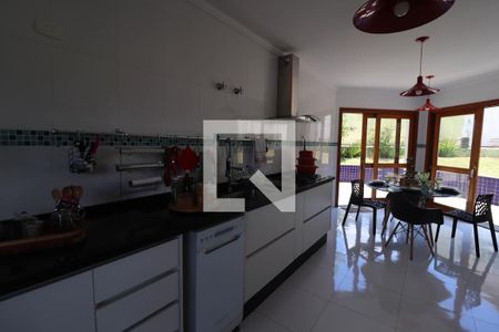 Casa de condomínio à venda com 600m², 4 quartos e 5 vagasCozinha e Área de Serviço