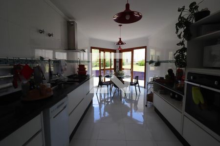 Casa de condomínio à venda com 600m², 4 quartos e 5 vagasCozinha e Área de Serviço