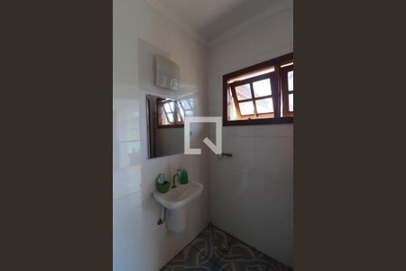 Casa de condomínio à venda com 600m², 4 quartos e 5 vagasBanheiro de Serviço