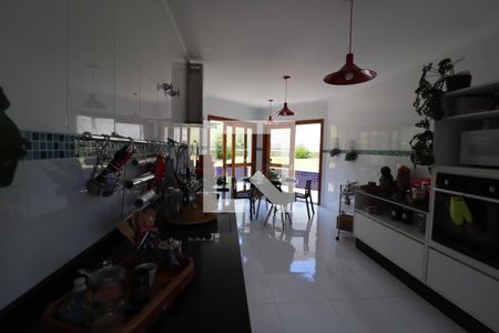 Casa de condomínio à venda com 600m², 4 quartos e 5 vagasCozinha e Área de Serviço