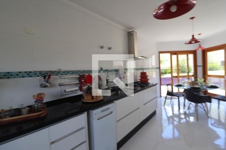 Casa de condomínio à venda com 600m², 4 quartos e 5 vagasCozinha e Área de Serviço