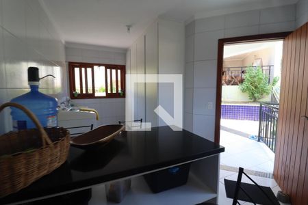 Casa de condomínio à venda com 600m², 4 quartos e 5 vagasCozinha e Área de Serviço