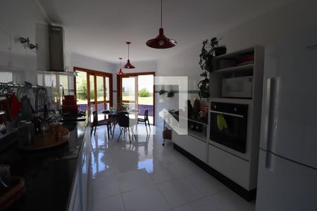 Casa de condomínio à venda com 600m², 4 quartos e 5 vagasCozinha e Área de Serviço