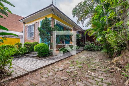 Casa à venda com 400m², 3 quartos e 2 vagas Casa à venda com 400m², 3 quartos e 2 vagasFachada