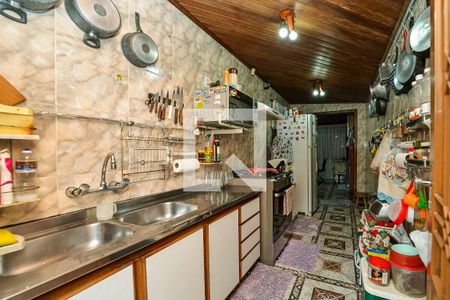 Casa à venda com 200m², 3 quartos e 4 vagas Casa à venda com 200m², 3 quartos e 4 vagasCozinha