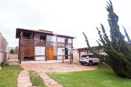 Casa de condomínio para alugar com 300m², 2 quartos e 4 vagasFachada