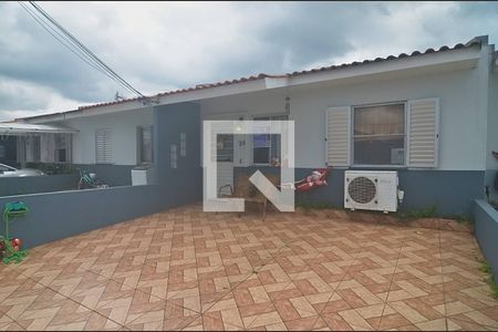 Casa de condomínio à venda com 80m², 2 quartos e 2 vagasFachada da casa