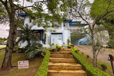 Casa de condomínio à venda com 450m², 4 quartos e 6 vagasFachada