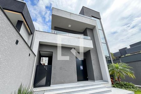 Casa de condomínio à venda com 800m², 5 quartos e 10 vagasFachada + plaquinha