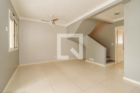 Sala de casa de condomínio à venda com 3 quartos, 144m² em Vila Nova, Porto Alegre