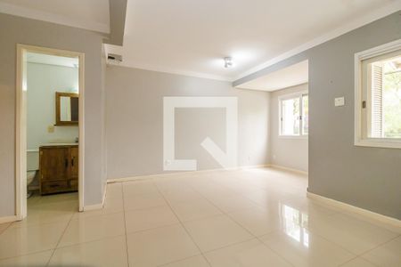 Sala de casa de condomínio à venda com 3 quartos, 144m² em Vila Nova, Porto Alegre
