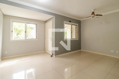 Sala de casa de condomínio à venda com 3 quartos, 144m² em Vila Nova, Porto Alegre