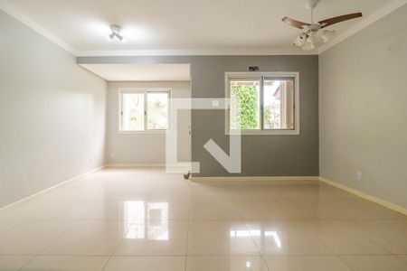 Sala de casa de condomínio à venda com 3 quartos, 144m² em Vila Nova, Porto Alegre