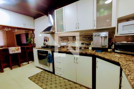 Casa de condomínio à venda com 272m², 3 quartos e 4 vagasCozinha 