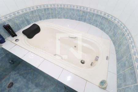 Casa à venda com 450m², 4 quartos e 4 vagasBanheiro Suíte 3