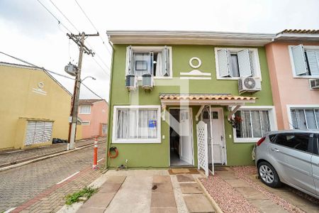 Casa de condomínio à venda com 78m², 2 quartos e 1 vagaFachada da casa