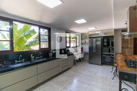 Casa de condomínio para alugar com 370m², 4 quartos e 3 vagasCozinha