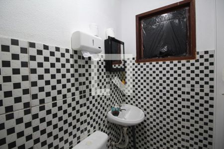 Casa de condomínio à venda com 700m², 5 quartos e 4 vagasBanheiro de Serviço 1