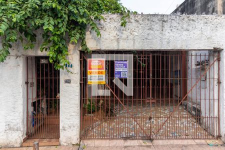 Casa à venda com 261m², 4 quartos e 3 vagas Casa à venda com 261m², 4 quartos e 3 vagasFachada