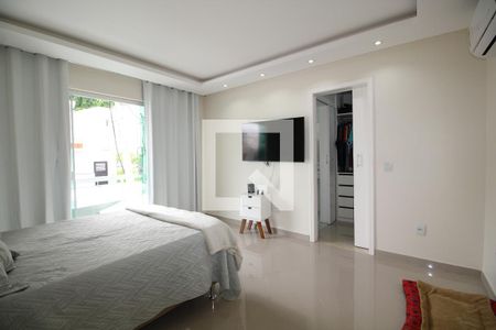 Casa de condomínio à venda com 560m², 4 quartos e 2 vagasSuíte 1