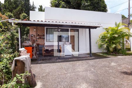 Casa de condomínio à venda com 450m², 4 quartos e 2 vagasfachada edícula