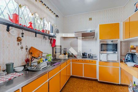 Casa à venda com 250m², 4 quartos e 5 vagas Casa à venda com 250m², 4 quartos e 5 vagasCozinha e Área de Serviço