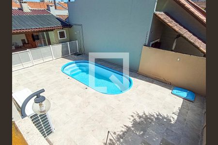 Casa de condomínio à venda com 210m², 3 quartos e 3 vagasSacada do Quarto 3 - Vista