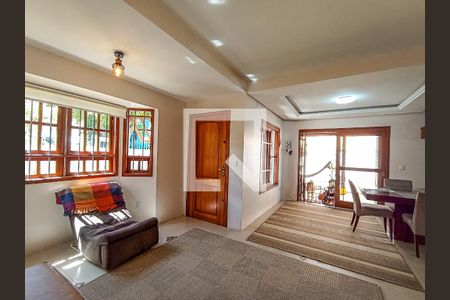 Sala de casa de condomínio à venda com 3 quartos, 210m² em Hípica, Porto Alegre