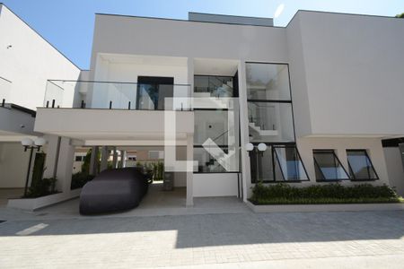 Casa de condomínio para alugar com 350m², 4 quartos e 4 vagasFachada