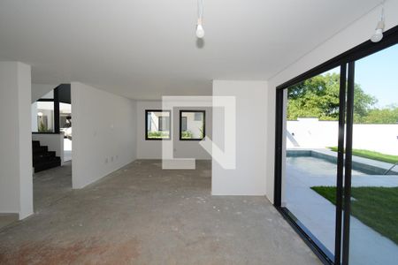 Casa de condomínio para alugar com 350m², 4 quartos e 4 vagasSala