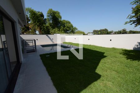 Casa de condomínio para alugar com 350m², 4 quartos e 4 vagasQuintal