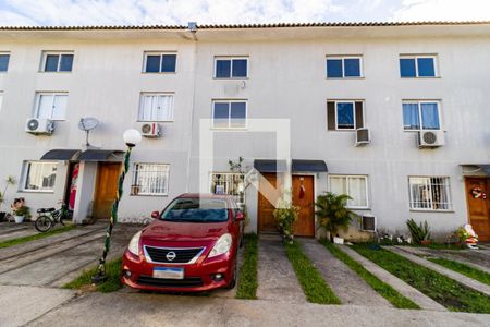 Casa de condomínio à venda com 64m², 3 quartos e 1 vaga Casa de condomínio à venda com 64m², 3 quartos e 1 vagaFachada