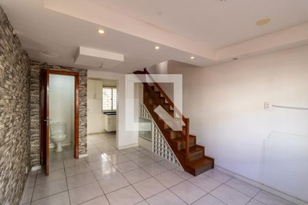 Sala  de casa de condomínio à venda com 3 quartos, 64m² em Hípica, Porto Alegre