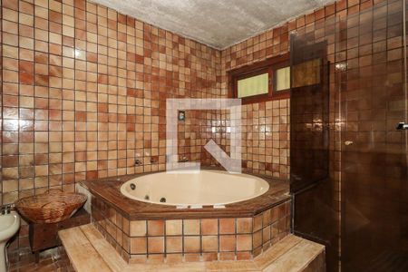 Casa à venda com 350m², 5 quartos e 4 vagasBanheiro da Suíte 1