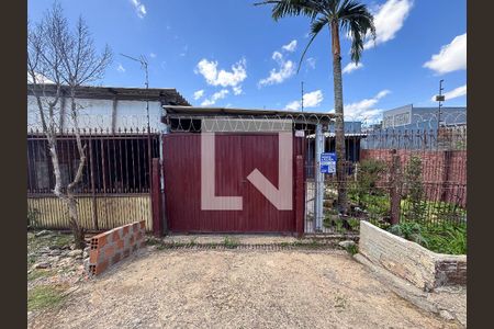 Casa à venda com 70m², 2 quartos e 2 vagasplaquinha fachada