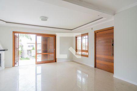 Sala de casa de condomínio à venda com 3 quartos, 188m² em Hípica, Porto Alegre