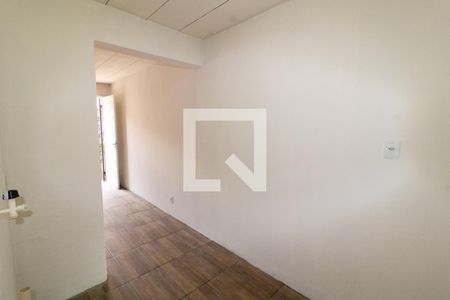 Cozinha de casa de condomínio à venda com 2 quartos, 50m² em Vila Nova, Porto Alegre