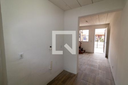 Cozinha de casa de condomínio à venda com 2 quartos, 50m² em Vila Nova, Porto Alegre