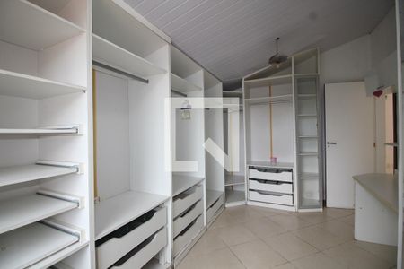 Casa de condomínio para alugar com 200m², 4 quartos e 4 vagasQuarto 2 - Closet