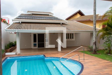 Casa de condomínio à venda com 394m², 4 quartos e 5 vagas Casa de condomínio à venda com 394m², 4 quartos e 5 vagasFACHADA FUNDOS