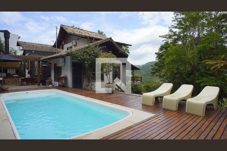 Casa de condomínio para alugar com 380m², 4 quartos e 6 vagasÁrea comum - Piscina