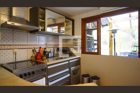 Casa de condomínio para alugar com 380m², 4 quartos e 6 vagasCozinha