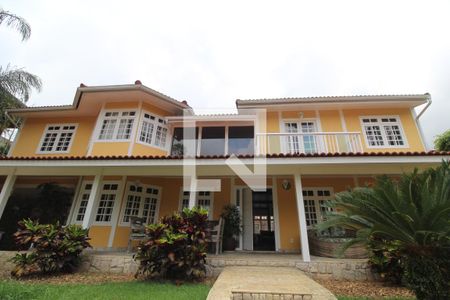 Casa de condomínio à venda com 477m², 5 quartos e 2 vagasFachada