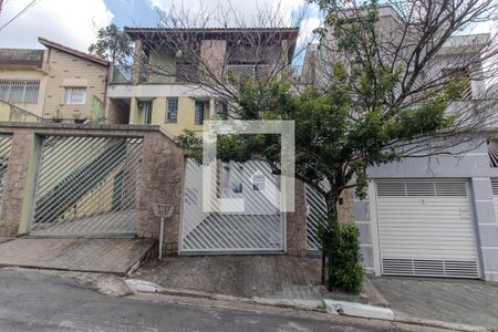 Casa à venda com 195m², 4 quartos e 3 vagas Casa à venda com 195m², 4 quartos e 3 vagasFachada e placa