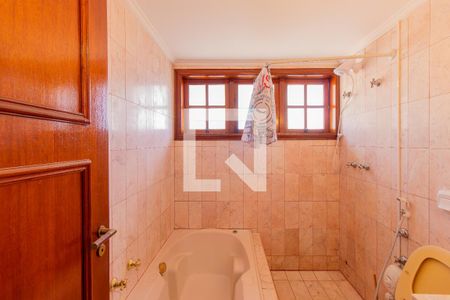 Casa de condomínio para alugar com 454m², 8 quartos e 6 vagas Casa de condomínio para alugar com 454m², 8 quartos e 6 vagasBanheiro da Suíte 1