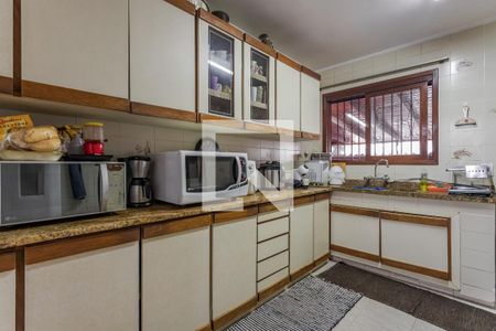 Casa à venda com 424m², 3 quartos e 4 vagas Casa à venda com 424m², 3 quartos e 4 vagasCozinha e Área de Serviço