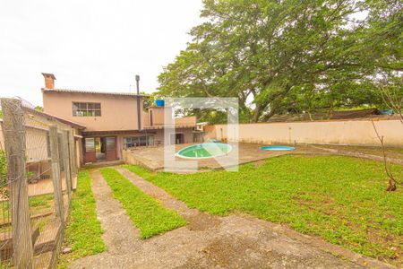 Area externa/piscina de casa à venda com 5 quartos, 256m² em Estância Velha, Canoas