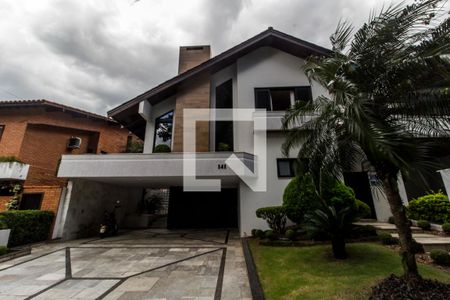 Casa de condomínio à venda com 380m², 3 quartos e 4 vagas Casa de condomínio à venda com 380m², 3 quartos e 4 vagasGaragem