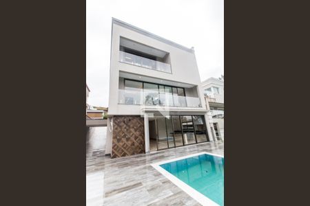 Casa de condomínio à venda com 524m², 4 quartos e 4 vagasFachada