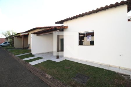 Casa de condomínio para alugar com 94m², 2 quartos e 1 vagaFachada da Casa e Placa